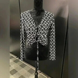 Meraki V-neck,cut out tie waist,lightweight,long sleeve crop top,swirl pattern